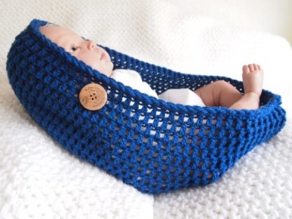 Blauwe baby cocoon.