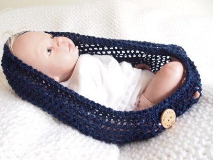 Baby cocoon met fijn glimdraad.
