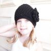 Zwarte beanie muts.
