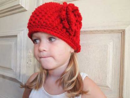 Rode beanie muts.