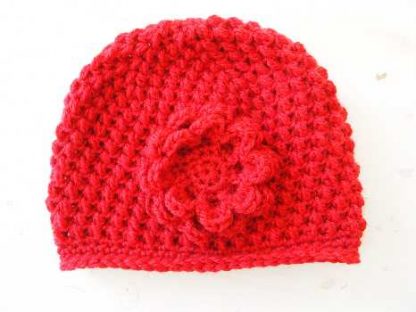 Rode beanie muts. - Afbeelding 2