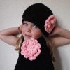 Zwarte beanie klotset.