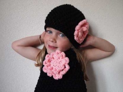 Zwarte beanie klotset.