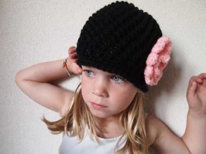 Zwarte beanie muts.