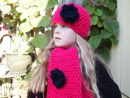 Beanieklotset / donkerblauwe bloem