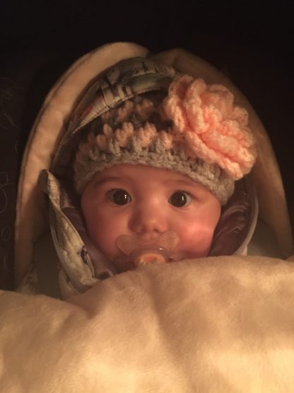 Gehaakte baby beanieklot.