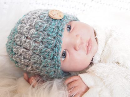 Baby beanie muts met knoop